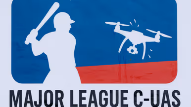Een logo van een honkbalspeler die naar een drone slaat.