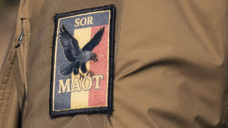 De badge van het Belgische MAOT op een mouw.
