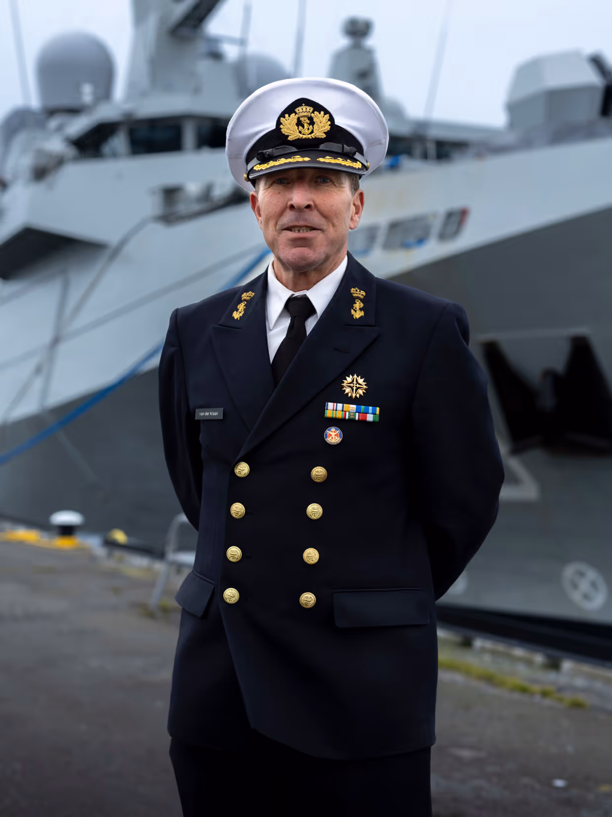 Portretfoto van kapitein-ter-zee Lex. 