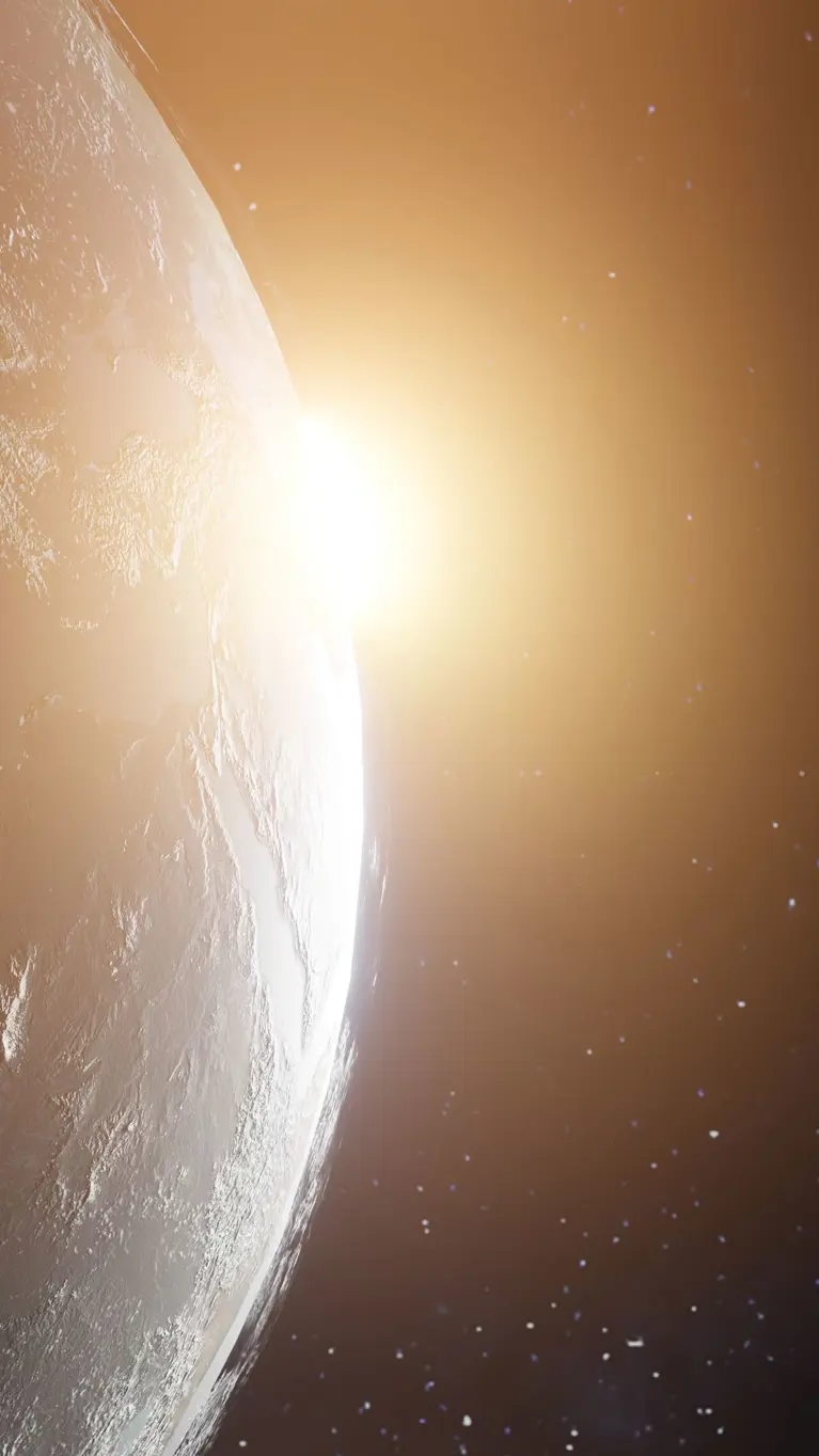 De wereld vanuit de ruimte gezien. Aan de zijkant komt de zon achter de aardbol tevoorschijn.