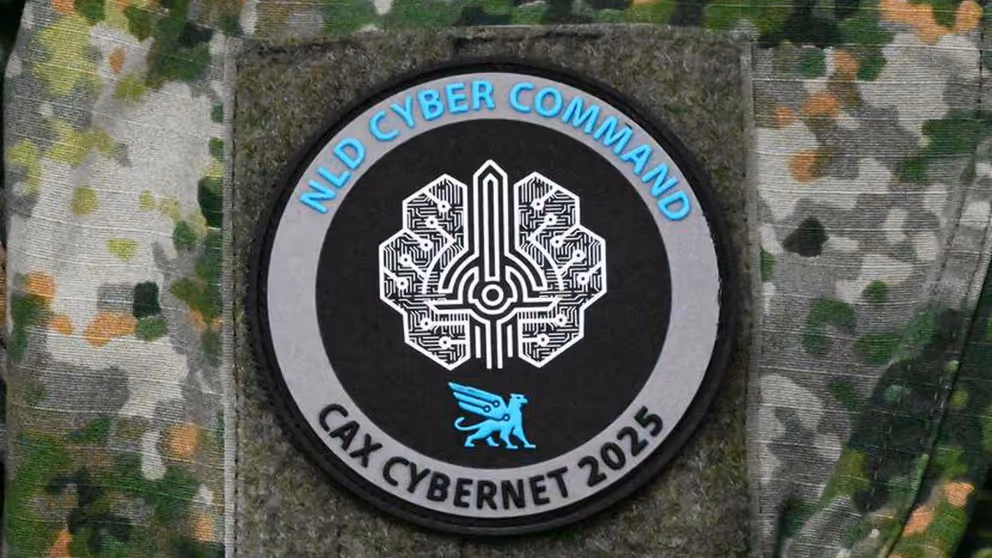 rond insigne van CAX CyberNet 2025.