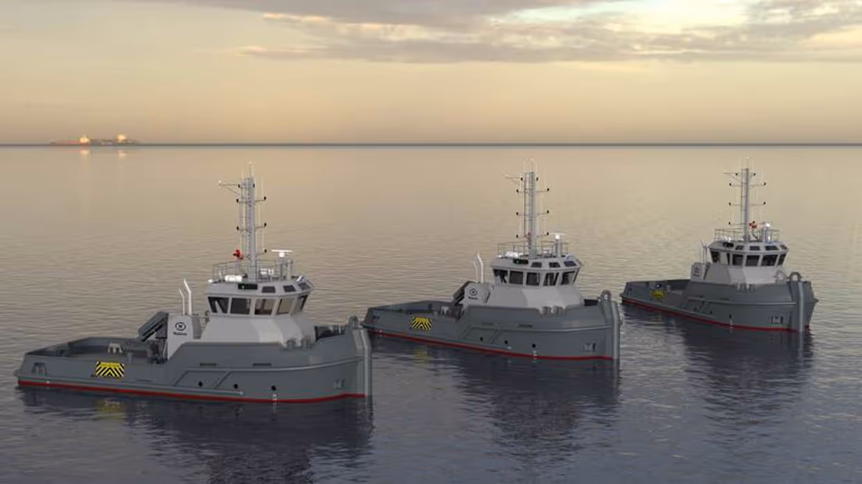 3 sleepboten in het water met de neuzen naar rechts.