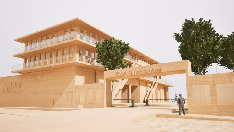 Een impressie van het nieuwe Militair Steunpunt op Sint-Maarten. Een zandkleurig gebouw van 4 verdiepingen. 