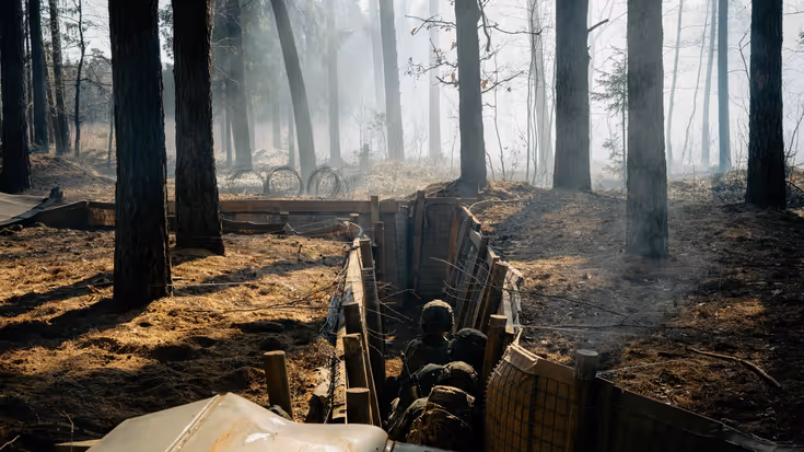Militairen in een loopgraaf.